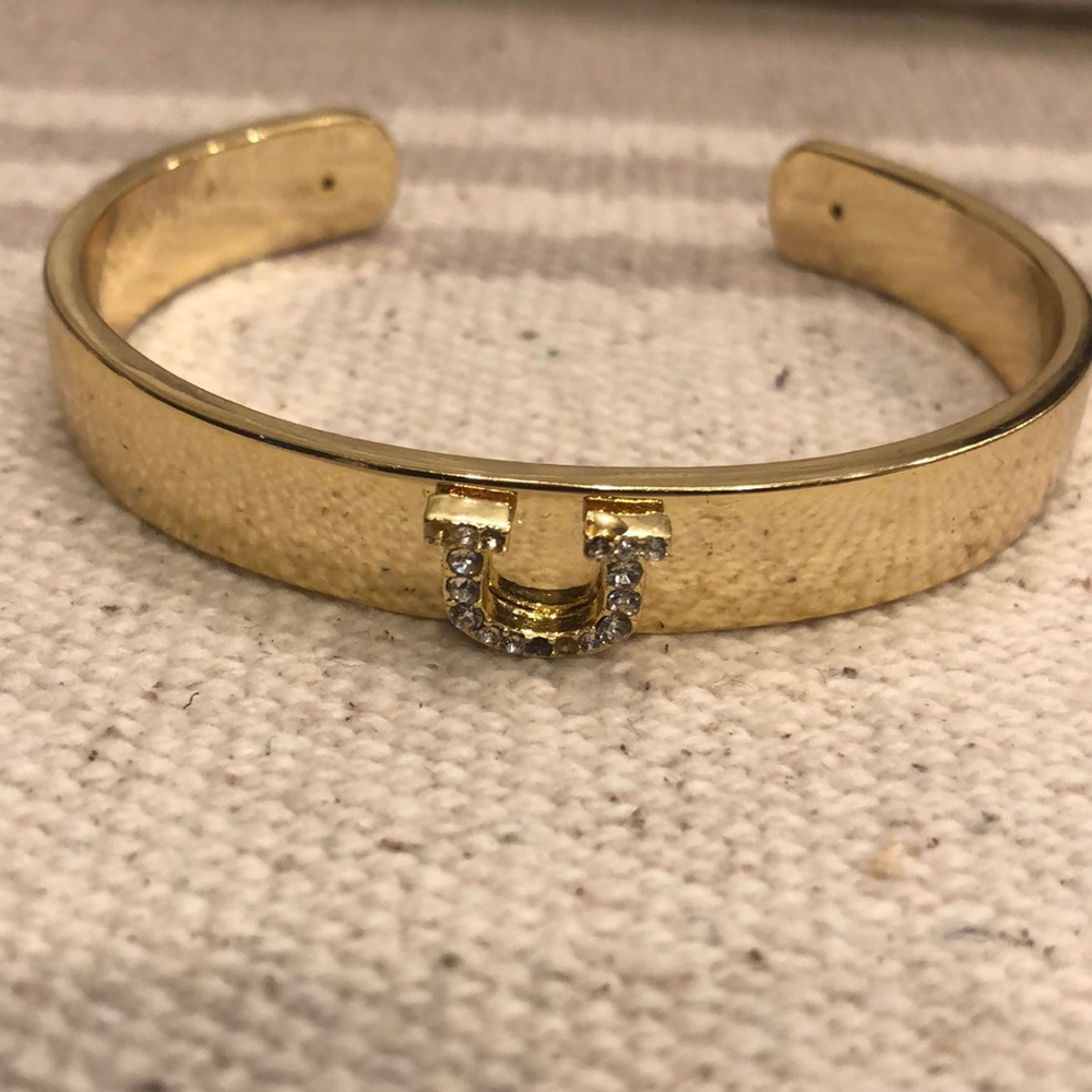 C. wonder gold cuff bracelet
